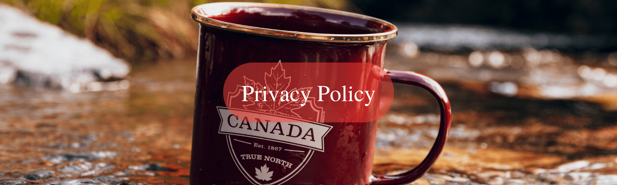 A red cup that says Canada on it in a steam.